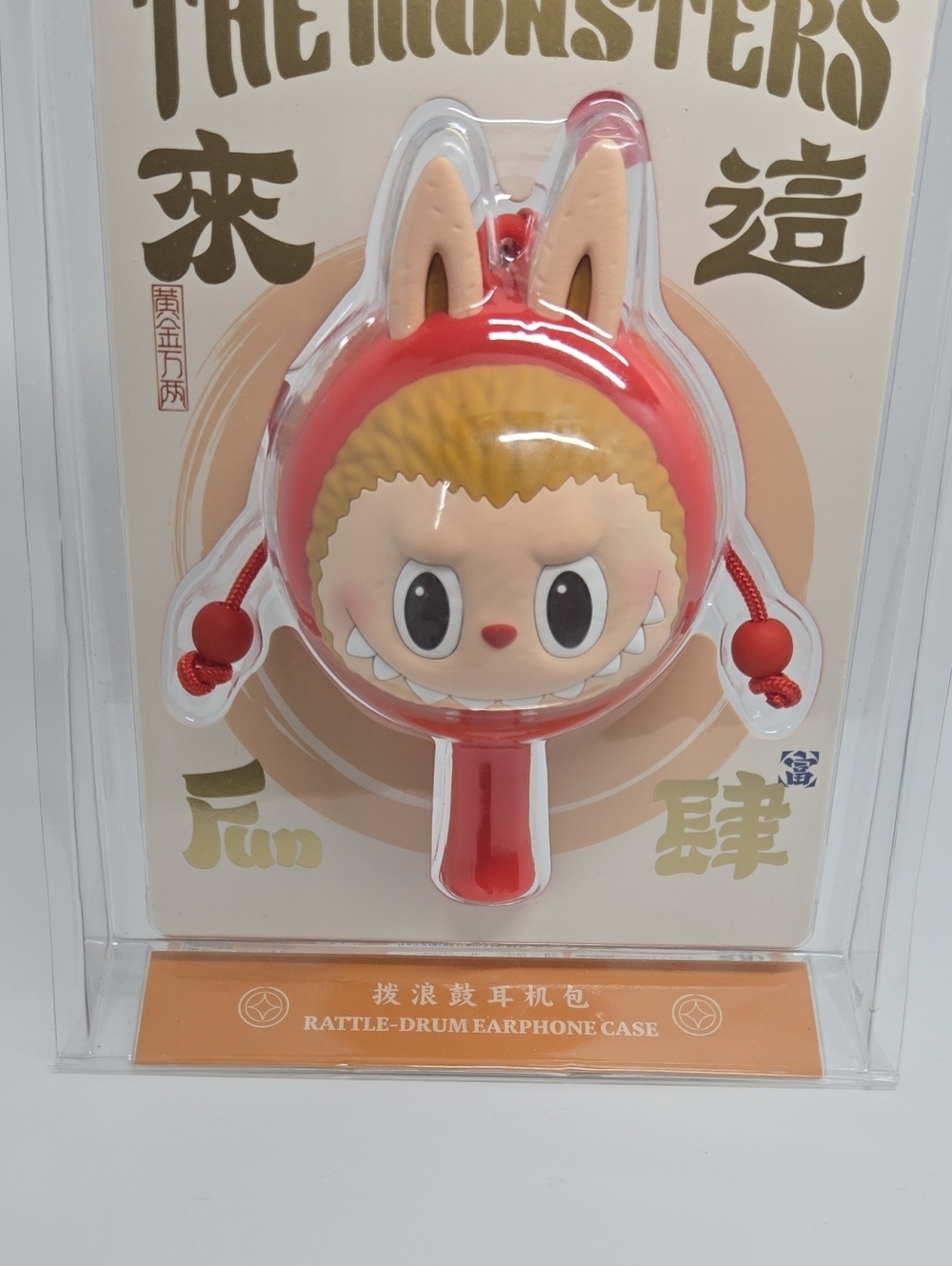 Pop MART Red Rattle-Drum Earphone Case – Fun Monster Design